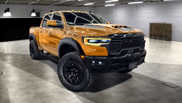 Stellantis CEO Carlos Tavares speaking at an auto industry event, with Dodge and Ram vehicles in the background.